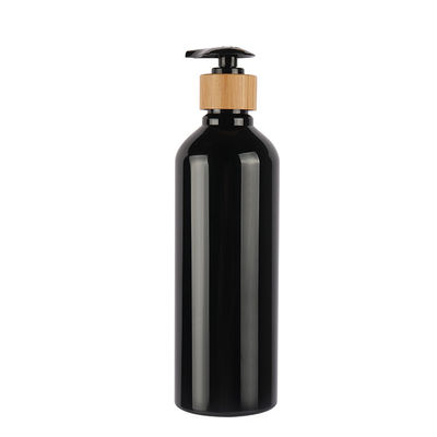 Zwarte ronde schouder PET cosmetische lotion fles met natuurlijke bamboe lotion pomp